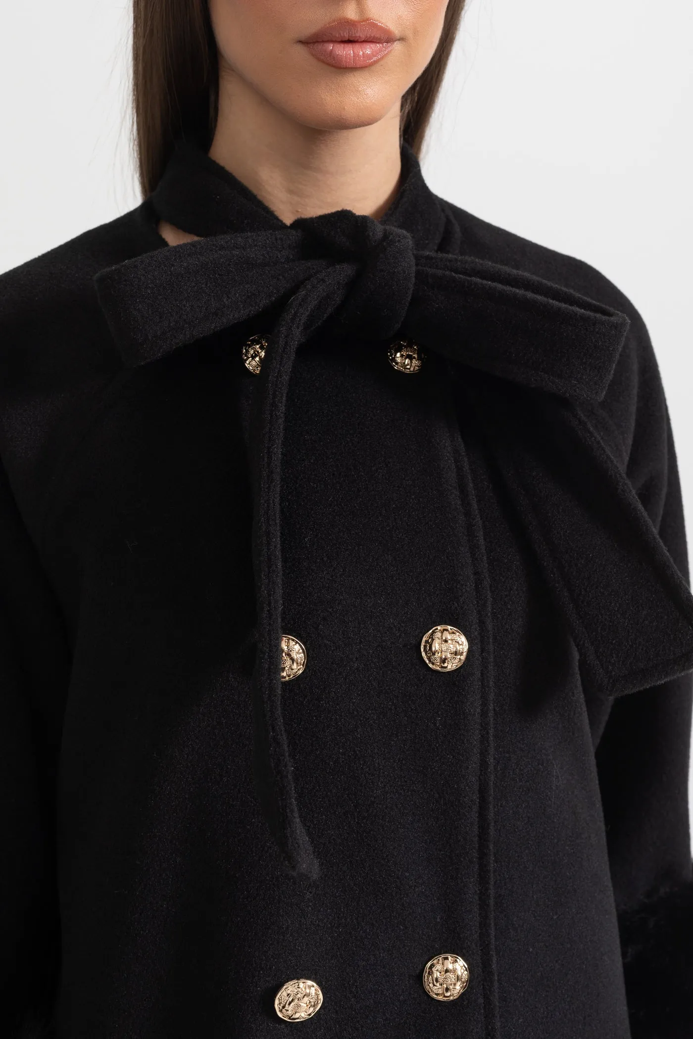Double Breasted Overcoat With Fur Cuff Accents And Neckline Ribbon - Black